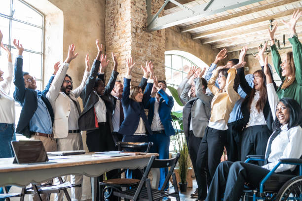 Portrait of happy employees in modern office